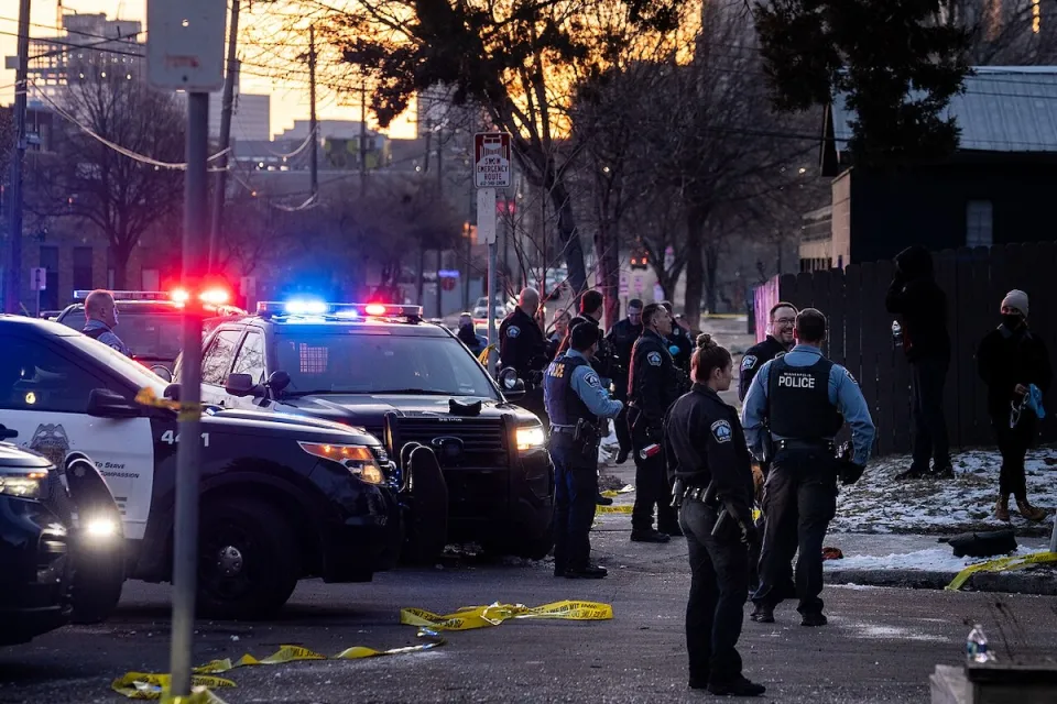 Police clearing a homeless encampment in Minneapolis, Minnesota.